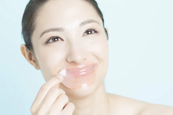 Young Woman Removing Pink Hydrogel Patch Her Lips Cosmetology Skin — Stock Photo, Image