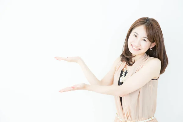Portrait Beautiful Japanese Woman Showing Something Hands White Background — Stock Photo, Image