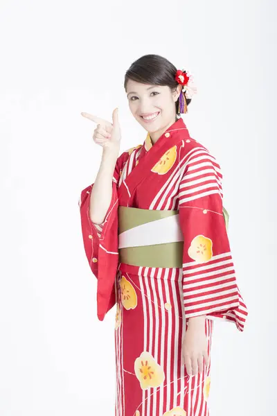Portrait Beautiful Young Woman Wearing Traditional Japanese Kimono Showing Something — Stock Photo, Image