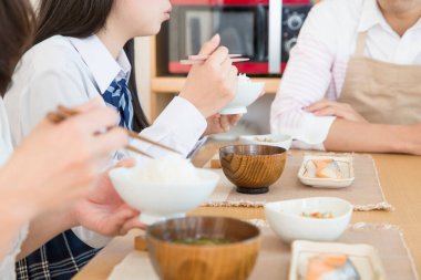 asian young people having breakfast 