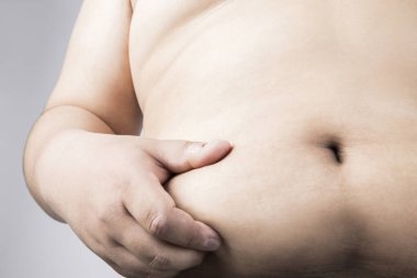 Koca göbekli şişman bir adam. Şişman adam. Stüdyo resmi