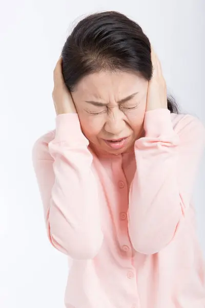 Senior Asin Woman Suffering Headache Isolated White Background — Stock Photo, Image