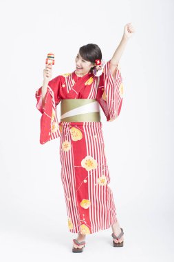 Kendama 'lı güzel bir Asyalı kadının portresi.