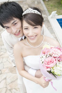 Güzel, mutlu Asyalı genç bir çiftin portresi.  