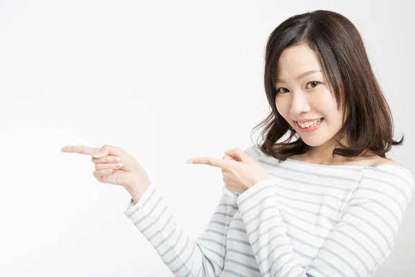 Güzel Japon Kadın Işaret Parmaklarıyla Beyaz Arka Planda Hareketler Yapıyor — Stok fotoğraf