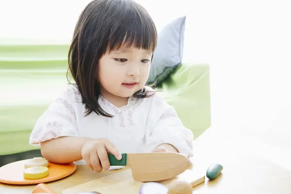 Cute Asian Little Girl Playing Living Room Home Royalty Free Stock Images