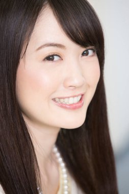 asian woman with a beautiful smile