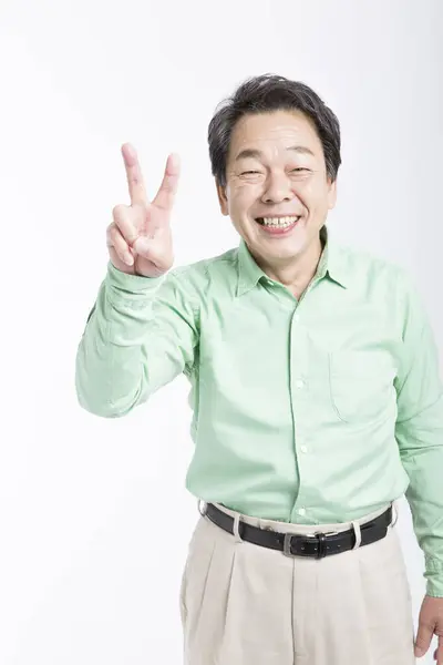 Starszy Azji Biznesmen Pokazując Ręka Gest — Zdjęcie stockowe