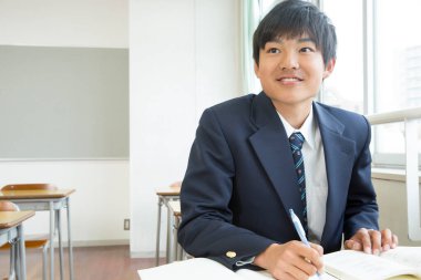 Sınıfta okuyan Japon öğrencinin portresi.