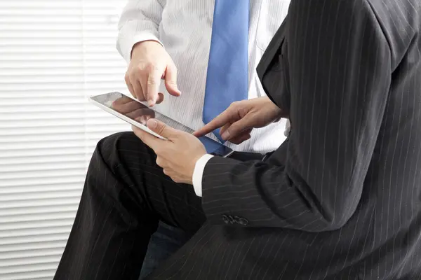 Young Businessmen Using Tablet Stock Picture