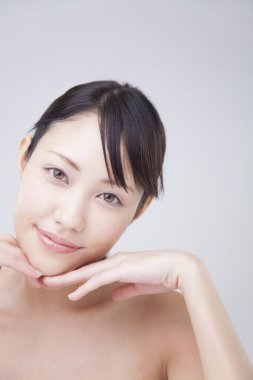 Mükemmel ciltli güzel bir Asyalı kadın. Yaklaş. Yüz bakımı ve kozmetoloji, güzellik ve kaplıca konsepti, kadın güzelliği