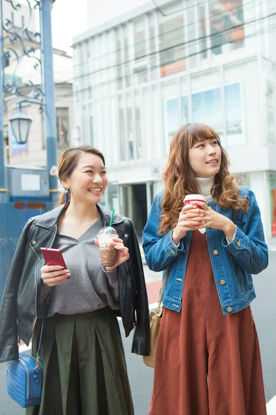 young beautiful asian women friends drinking coffee in city, lifestyle concept, original photoset