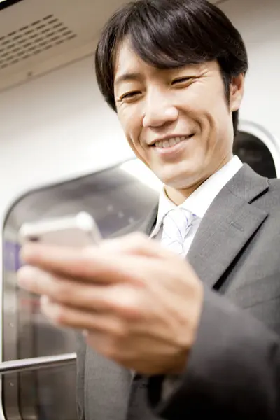 Young Businessman Using Smartphone Train — Stock Photo, Image