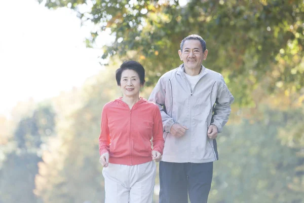 Asian Senior Couple Jogging Park — Stock Photo, Image