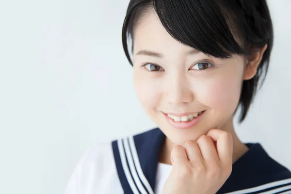 Retrato Sonriente Chica Asiática Vistiendo Uniforme Escolar Disparo Estudio — Foto de Stock