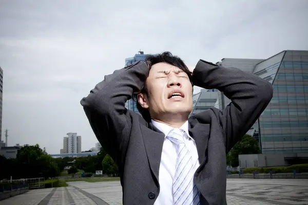Stressed Asian Business Man Street — Stock Photo, Image