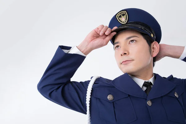 japanese police officer wearing  uniform