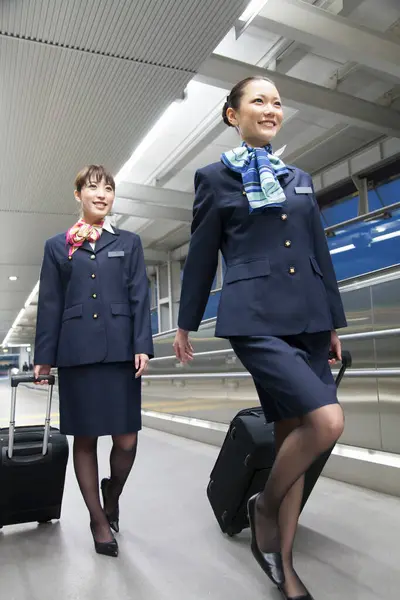 Two Flight Attendants Walking Airport — Stock Photo, Image