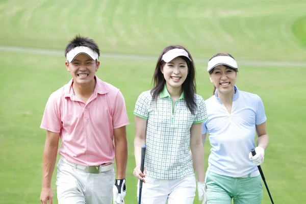 Unga Japaner Golfbana — Stockfoto