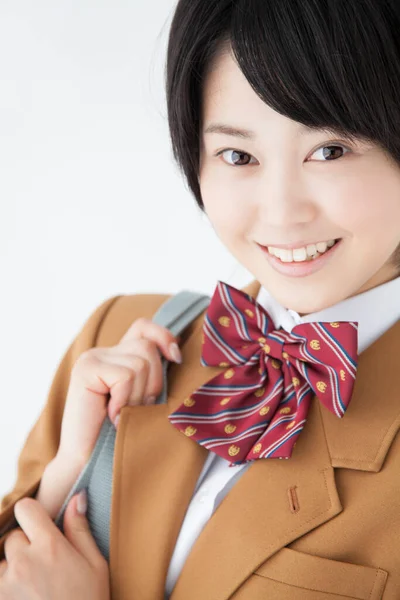 学校の制服のバッグに日本の女の子の肖像画 — ストック写真