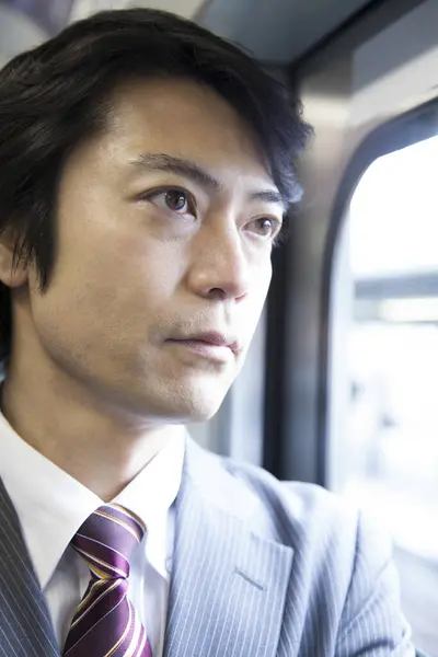 Joven Empresario Japonés Utilizando Transporte Público —  Fotos de Stock