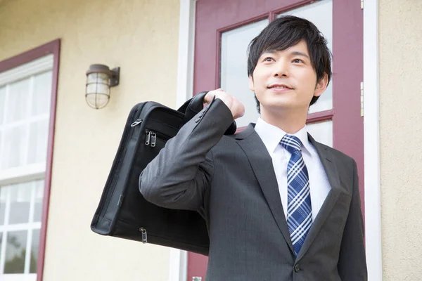 asian businessman with a briefcase