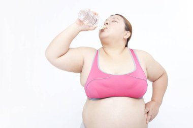 Japon bir kadının portresi aşırı kilolarla mücadele ediyor. Obezite kavramı.