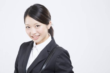 Elbiseli beyaz arka plan üzerinde izole işkadını