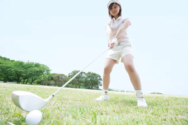 beautiful asian woman golf player