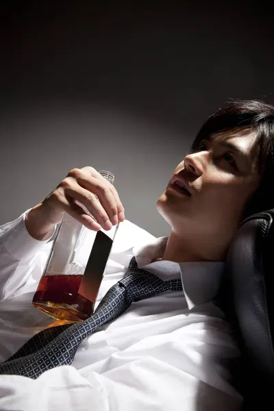 Young Businessman Drinking Whiskey Bottle — Stock Photo, Image