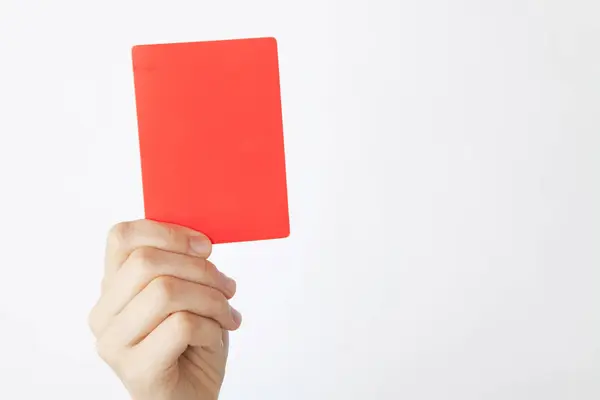 Red Card Hand Light Background — Stock Photo, Image