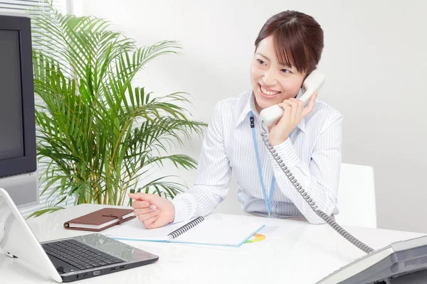 Young Female Call Center Worker Royalty Free Stock Images