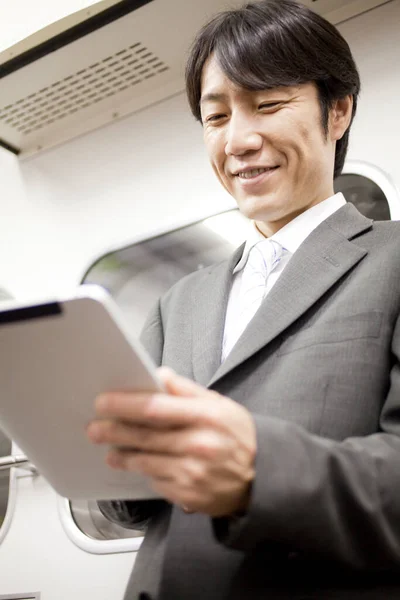Young Businessman Tablet Train — Stock Photo, Image