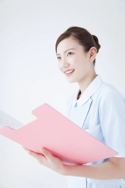 Portrait Japanese Female Nurse Holding Clipboard — Stock Photo, Image