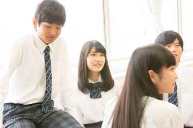 Asyalı öğrencilerin sınıfta portresi.