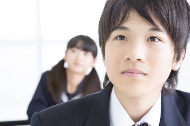 Asyalı çocukların ders çalışırkenki portresini kapat.  