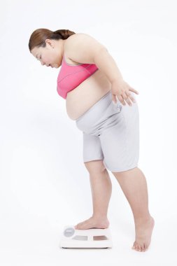 Japon bir kadının portresi aşırı kilolarla mücadele ediyor. Obezite kavramı.