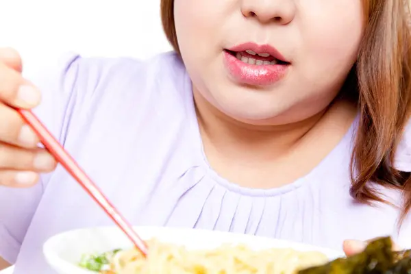 Overweight Asian Woman Eating Noodles Studio Portrait — Stock Photo, Image