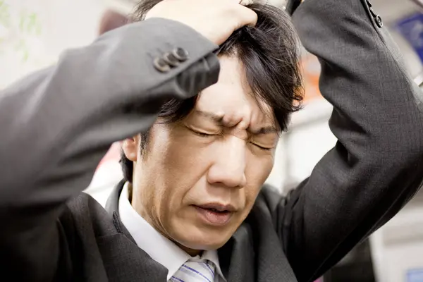 Asian Businessman Headache — Stock Photo, Image