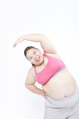 Aşırı kilolu Japon genç kadın eğitiminin stüdyo portresi