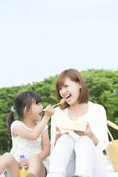 Mother Daughter Eating Picnic Park Stock Image