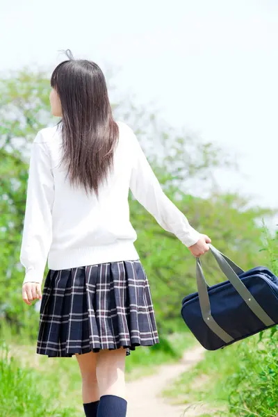 beautiful japanese schoolgirl during summer day