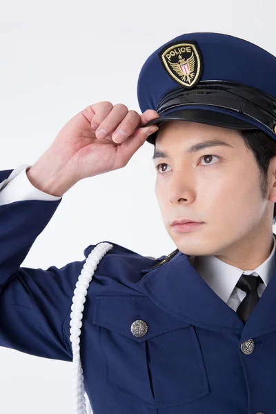 young asian man in uniform on white background