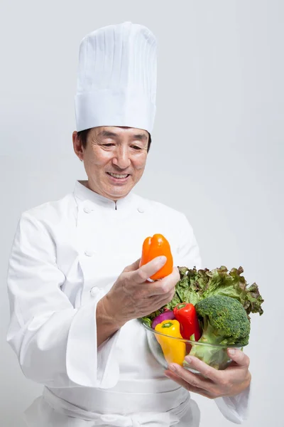 Close Portrait Japanese Chef Holding Vegetables Royalty Free Stock Images