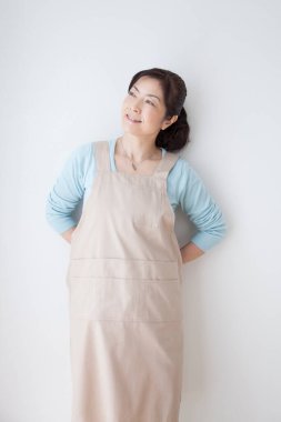 Mutfaktaki Asyalı genç bir kadının portresi..