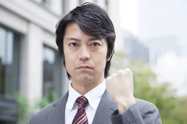 Asian Businessman Who Has Serious Expression Showing Fist — Stock Photo, Image