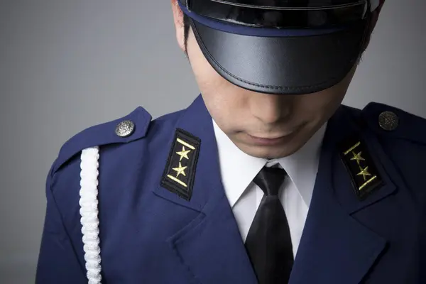 Retrato Estudio Del Oficial Policía Japonés Uniforme Sobre Fondo Gris — Foto de Stock
