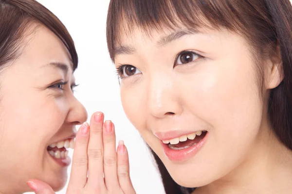 Asian Woman Sharing Secret Friend Royalty Free Stock Photos