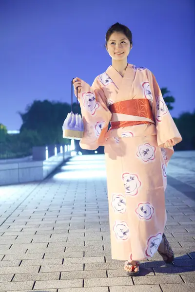 young beautiful japanese woman in kimono