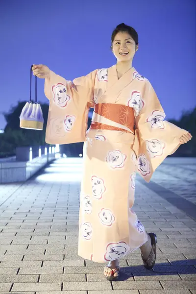 young beautiful japanese woman in kimono